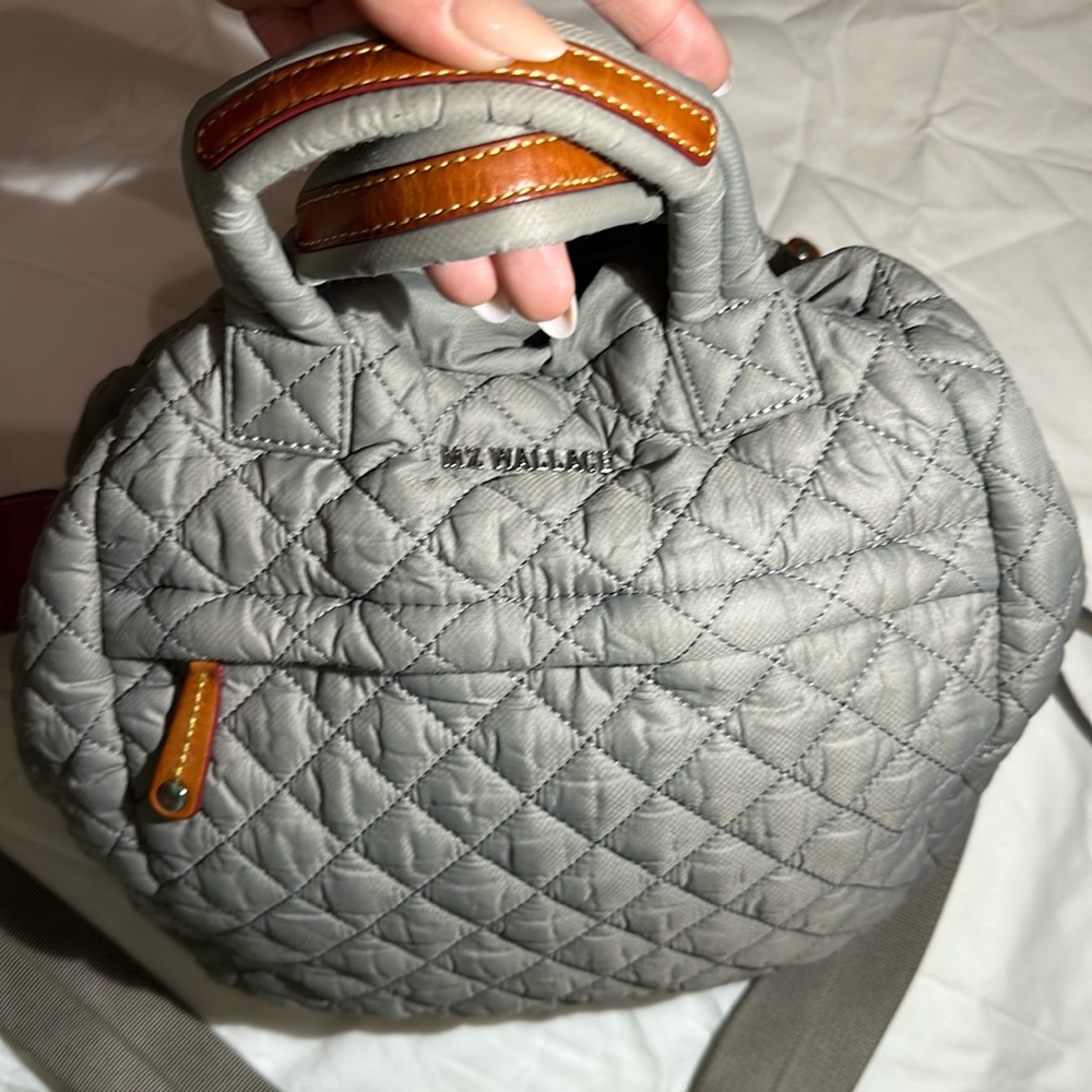 Mz Wallace gray bucket bag. Detachable straps with top handles.
